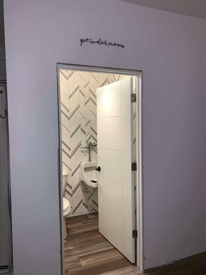 hall bathroom with urinal